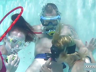 Babes take turns sucking dick underwater and they are so adventurous